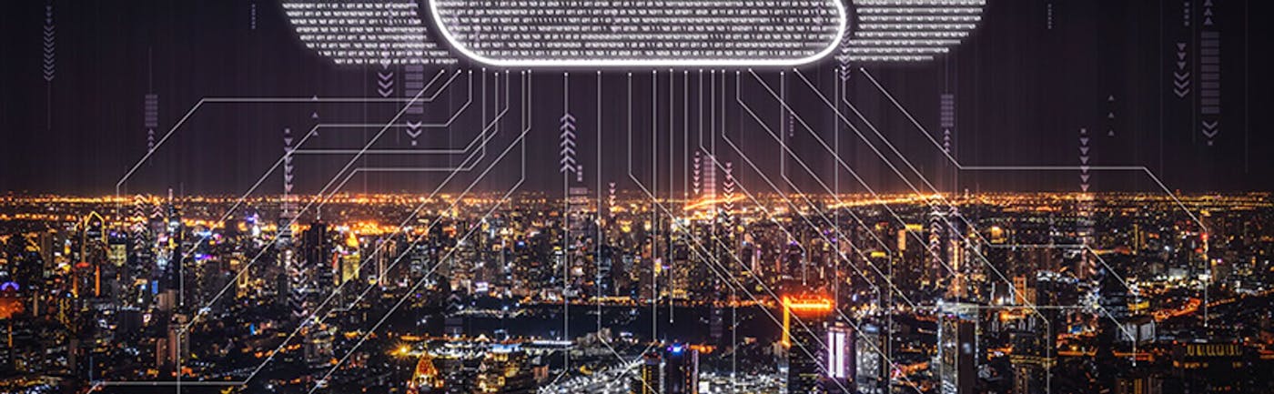 Image of a digital cloud over a nightime cityscape