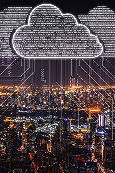 Image of a digital cloud over a nightime cityscape