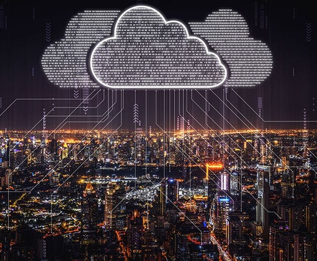 Image of a digital cloud over a nightime cityscape